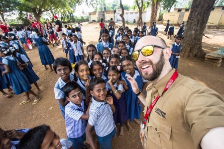 Glenn and school kids